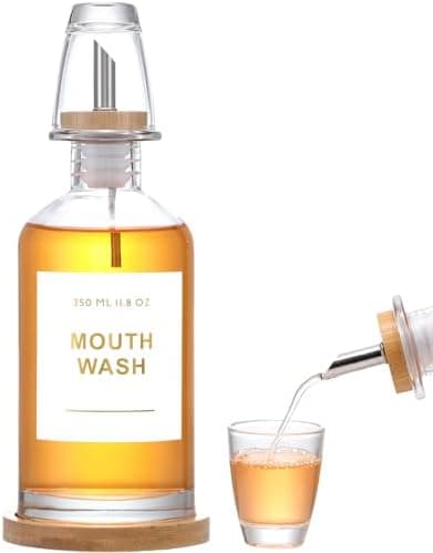 BONLONG 11.8OZ Glass Mouthwash Dispenser for Bathroom with Stainless Steel & Bamboo Nozzle, Mouthwash Cup Reusable, Bamboo Tray, and Elegant Gold Sticker.（Clear